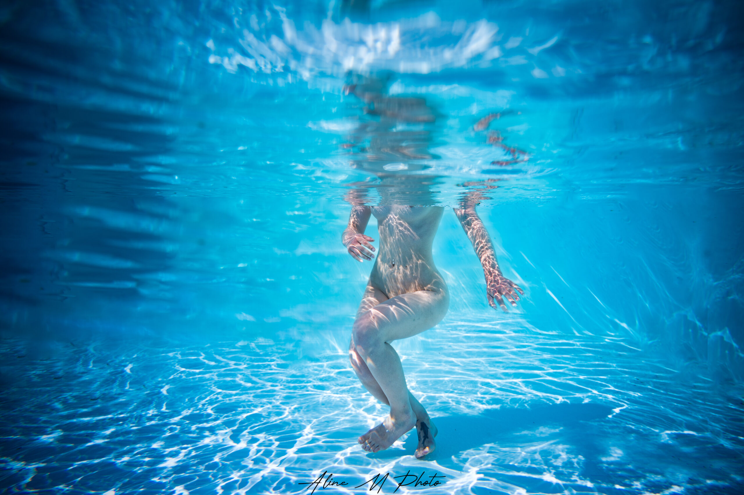 underwater sous l'eau photographie photographe grand est portrait alsace lorraine piscine grossesse lac photo couple aquatique aqua