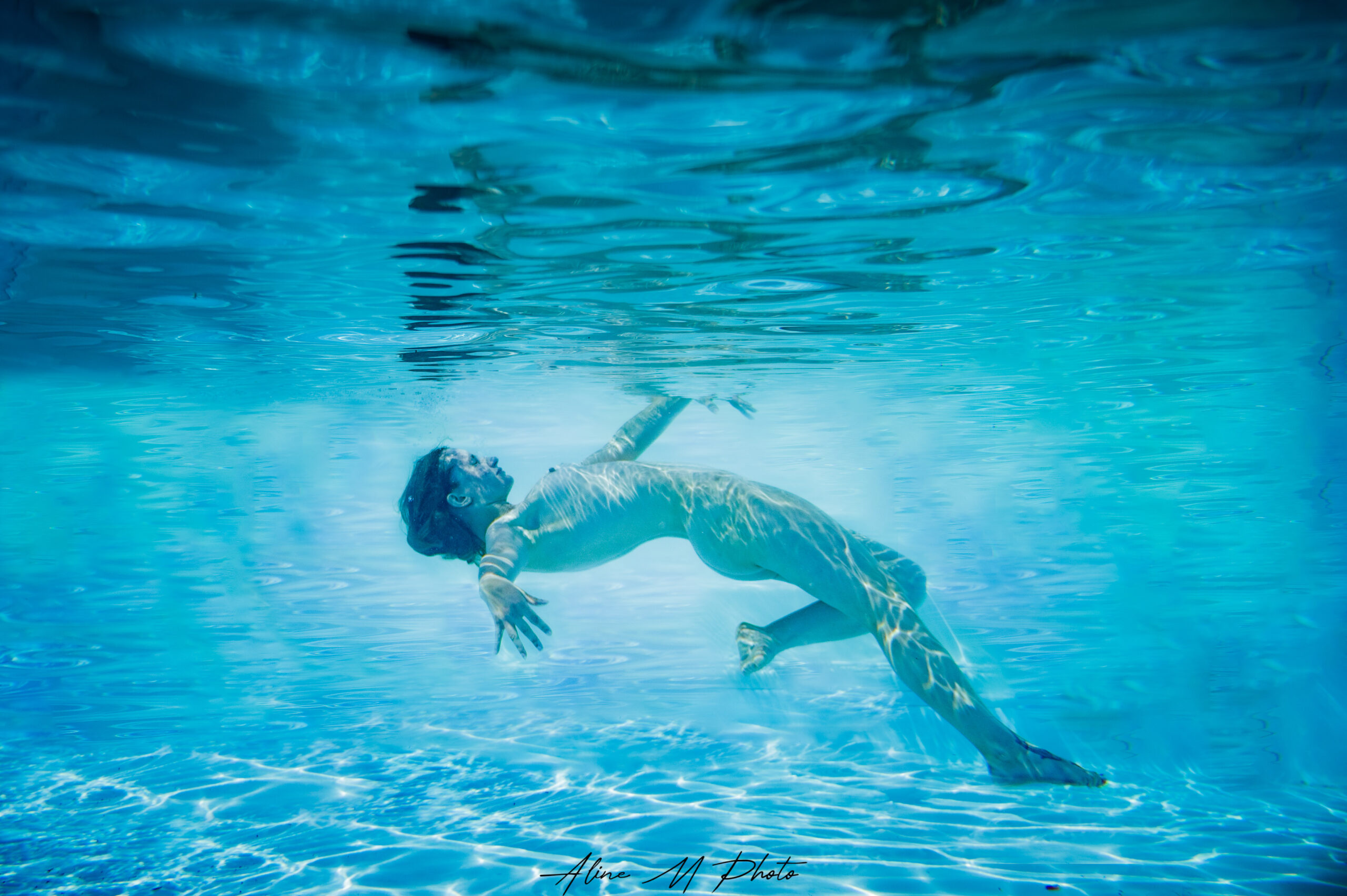 underwater sous l'eau photographie photographe grand est portrait alsace lorraine piscine grossesse lac photo couple aquatique